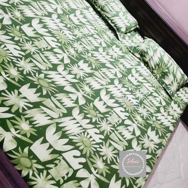 Leaf green printed bedsheet with same pillow covers