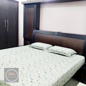 Green kids moon print hosiery bedsheet with same pillow covers